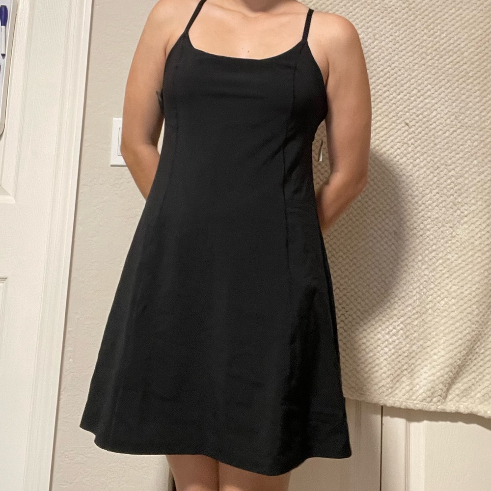 Offline by Aerie. Size medium. All black. Has built in shorts.